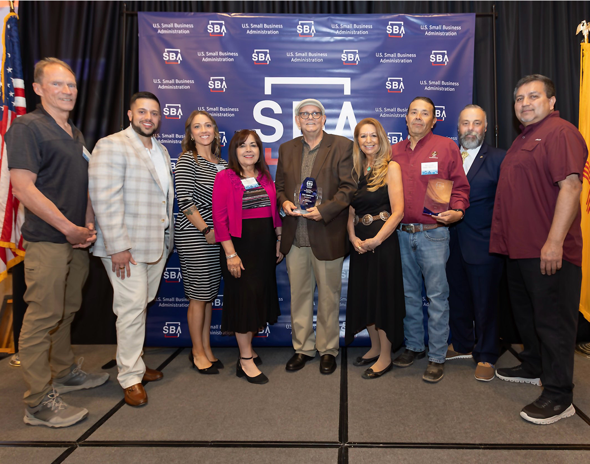 From left: Peter Fant, CEO of San Ildefonso Services; Daven Quintana, PMI Chief Operating Officer; Trish Alley, Small Business Advocate, LANL Small Business Program; Yvonne Gonzales, Small Business Program Manager, LANL; Eric Quintana, CEO and Co-founder of PMI (SBA National New Mexico Small Business of The Year Award); Julianna Martinez-Barbee, SBDC Director NNMC, New Mexico Small Business Development Center; Ron Lovato, CEO, TSAY Corporation and Pueblo Alliance, LLC (SBA National New Mexico Rural Small Business of the Year); Justin Crossie, SBA Region VI Regional Administrator and Larry Phillips Jr., COO Tsay Cooperation. Photo credit: Eric Williams Photography SBA photographer